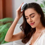 woman doing herself scalp massage